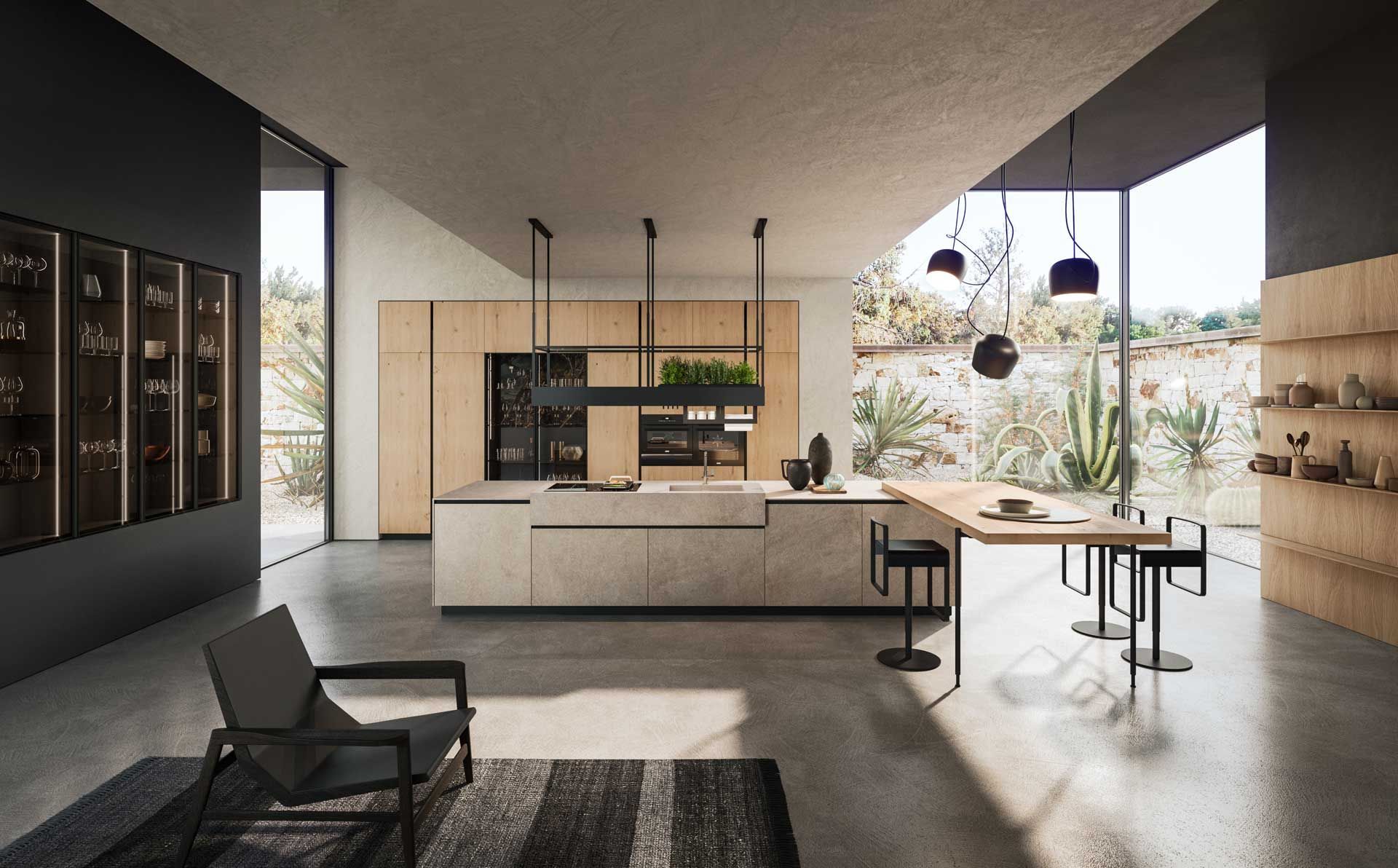 Una cucina con una grande isola e un tavolo