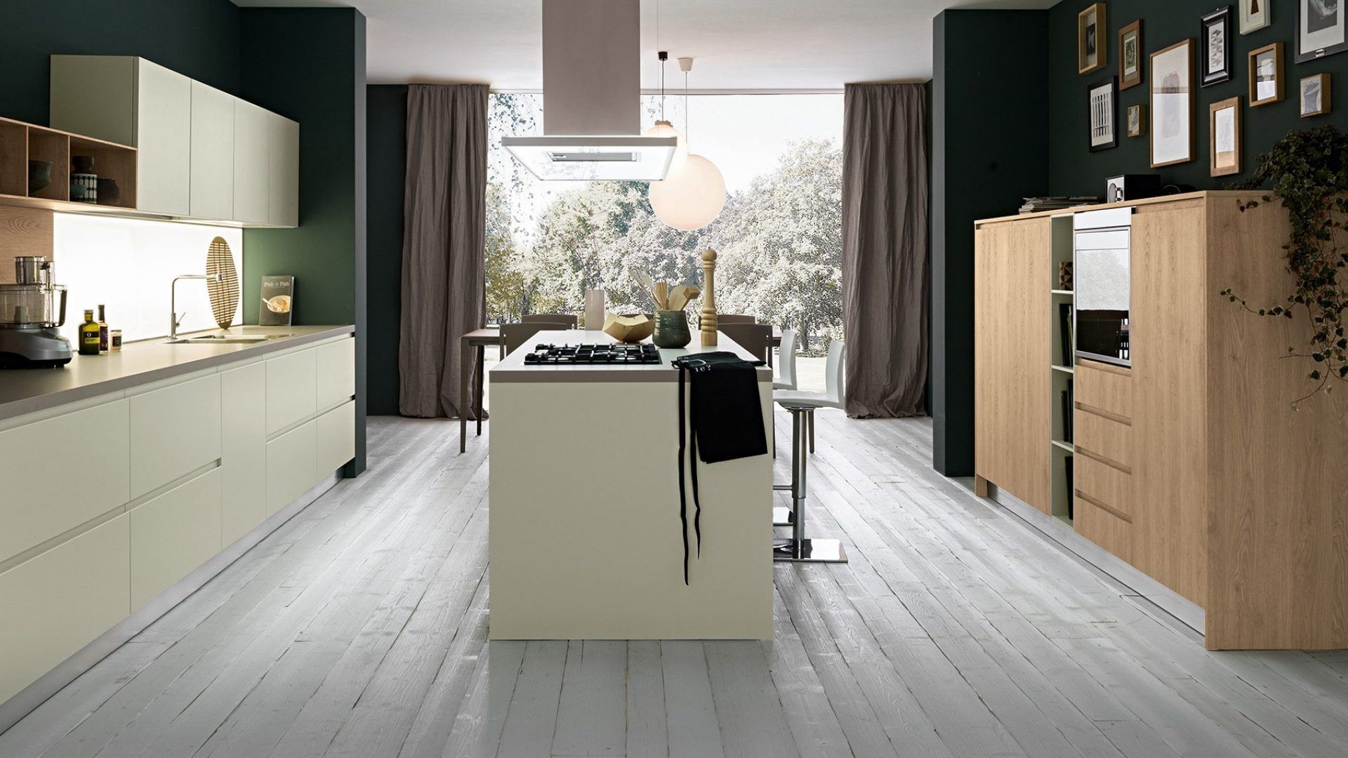 Una cucina con una grande isola al centro