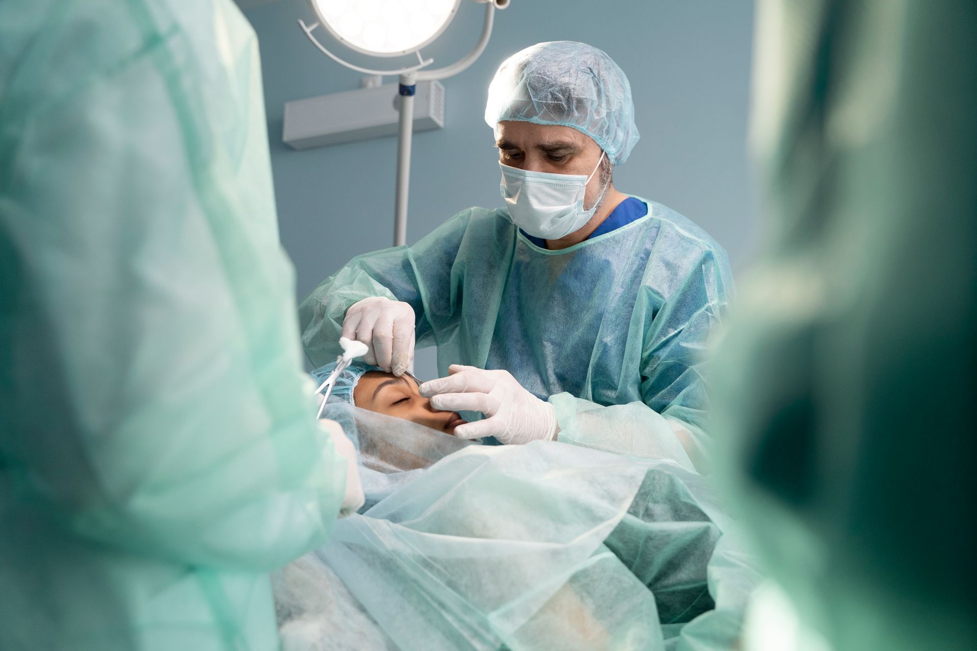 nose surgeon doing a sinus surgery