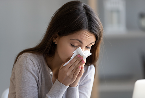 woman suffering from nasal congestion