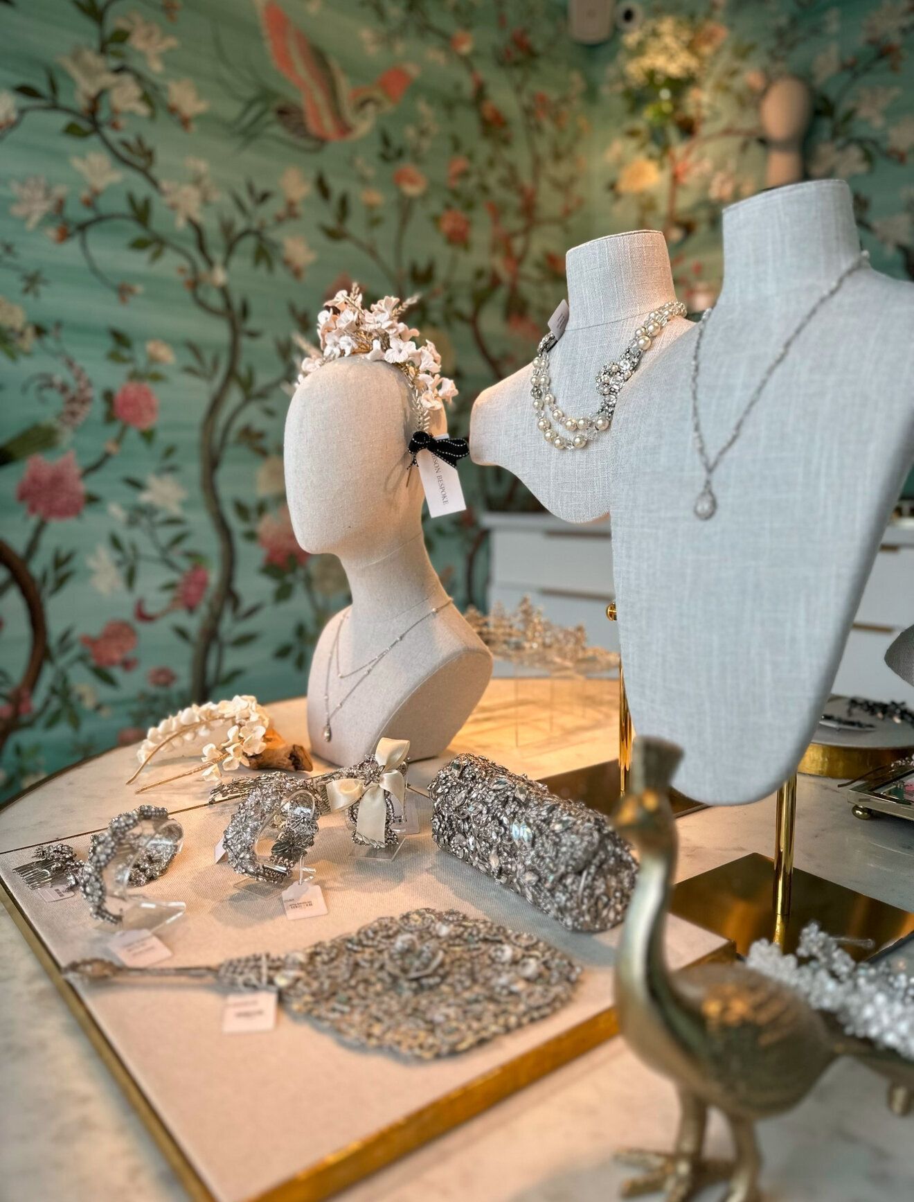 A table with a bunch of jewelry on it