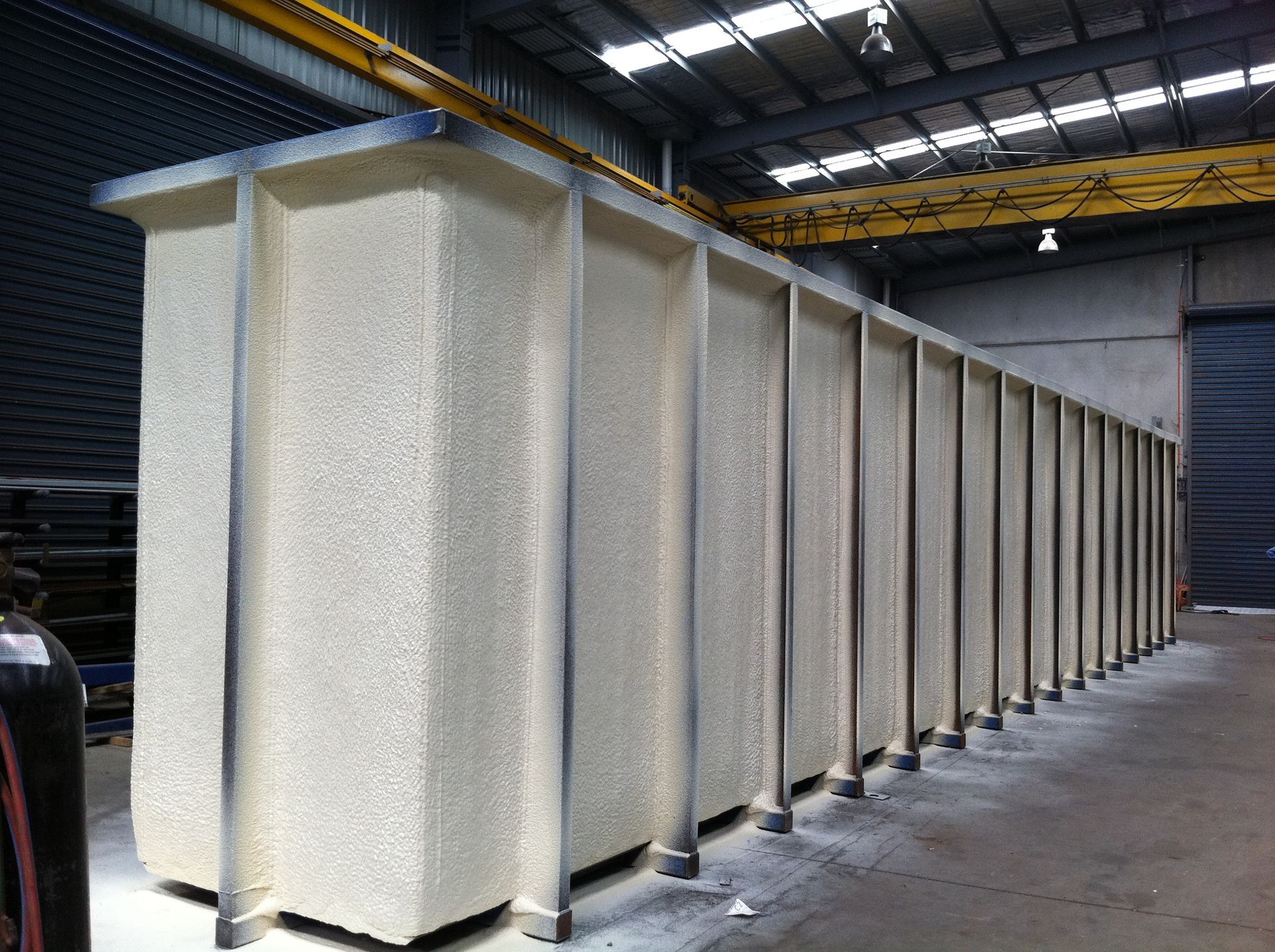An Insulation Foam into Inside Plate of a Tank | Pakenham, Vic | Advanced Foam & Coatings Pty Ltd