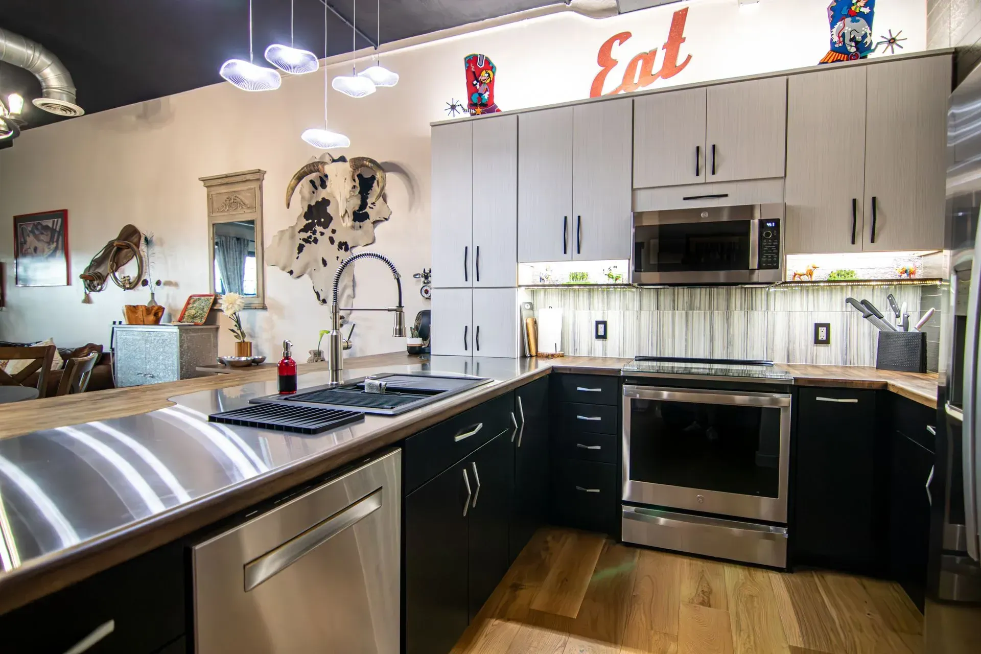 Kitchen remodel in Greenville, South Carolina: stainless counters dark cabinets
