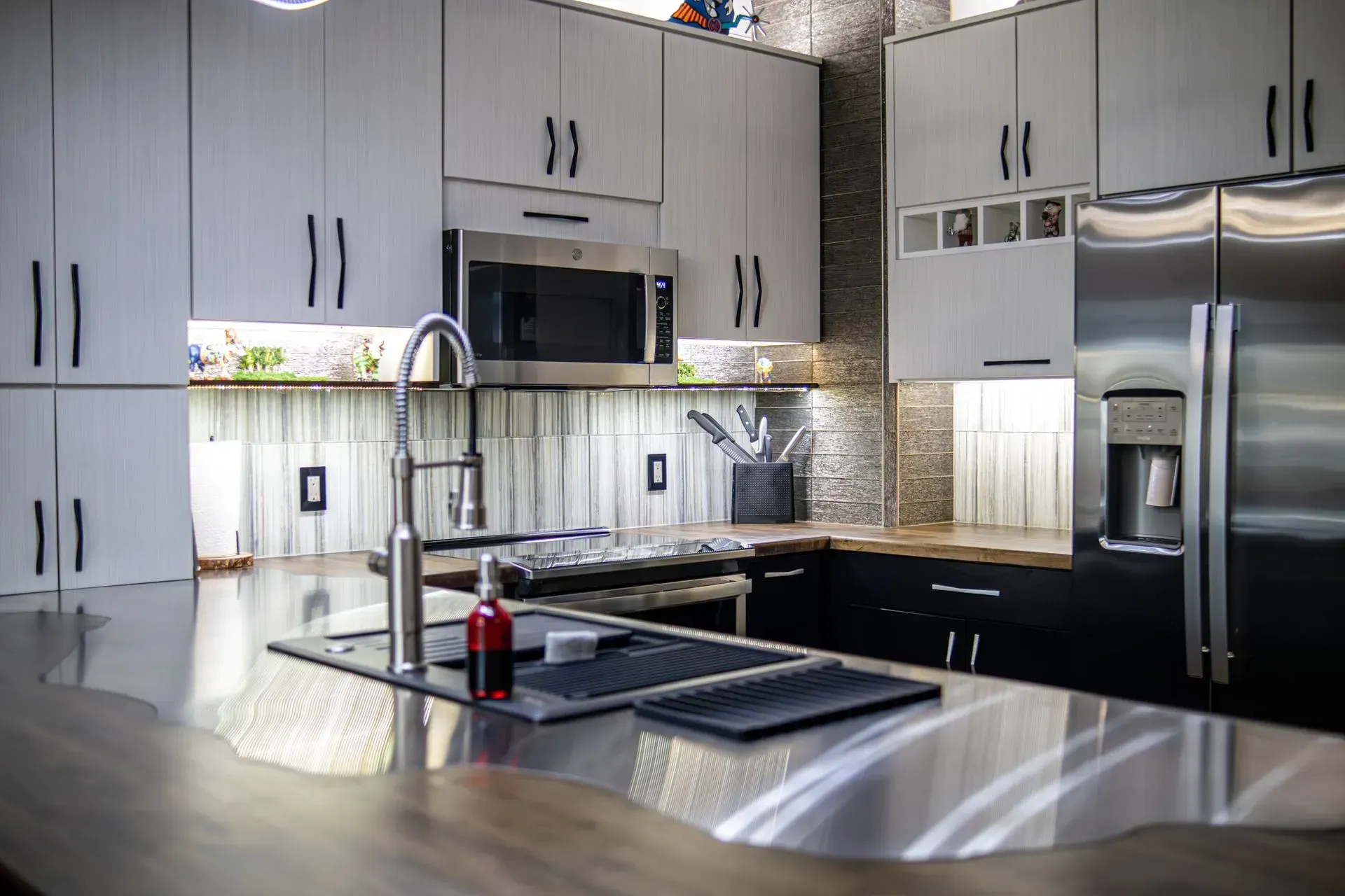 Kitchen remodel in Greenville, South Carolina: gray cabinets stainless appliances