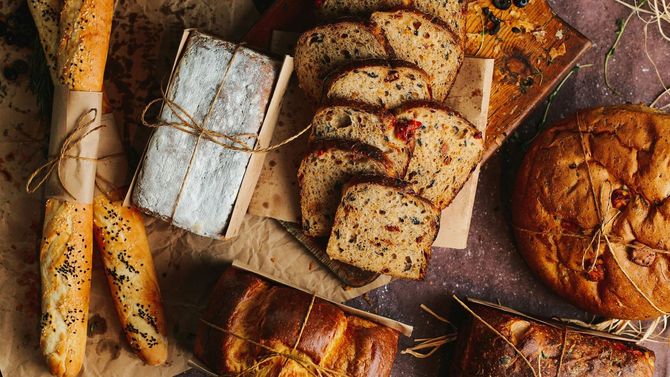 There are many different types of bread on the table. There are many different types of bread on the table.