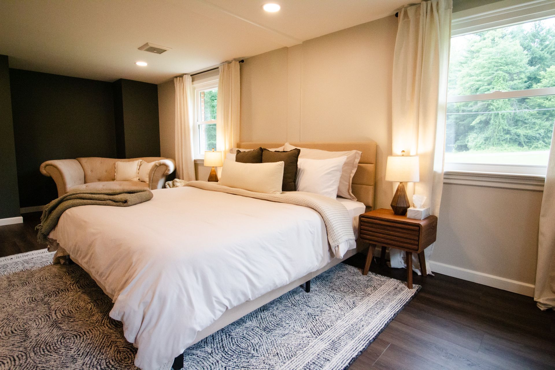 There is a large bed in the middle of the room.