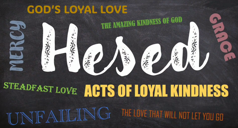 A chalkboard with the word hesed on it