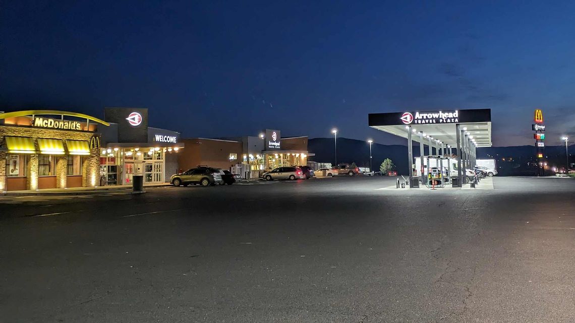 Arrowhead Travel Plaza outside at night