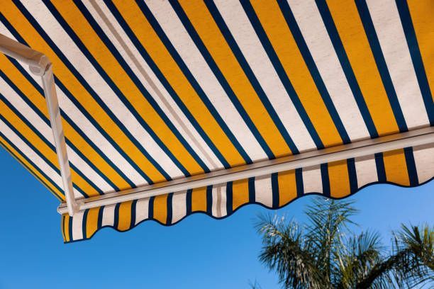 Yellow, Blue and White Stripe with Folding Arm Awnings - Blairgowrie, VIC - Curtains & Blinds by Dannielle Harris