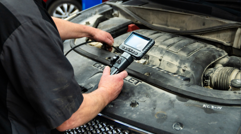 Expert Technician performing Diagnostics in Kansas City, MO | Howard Automotive