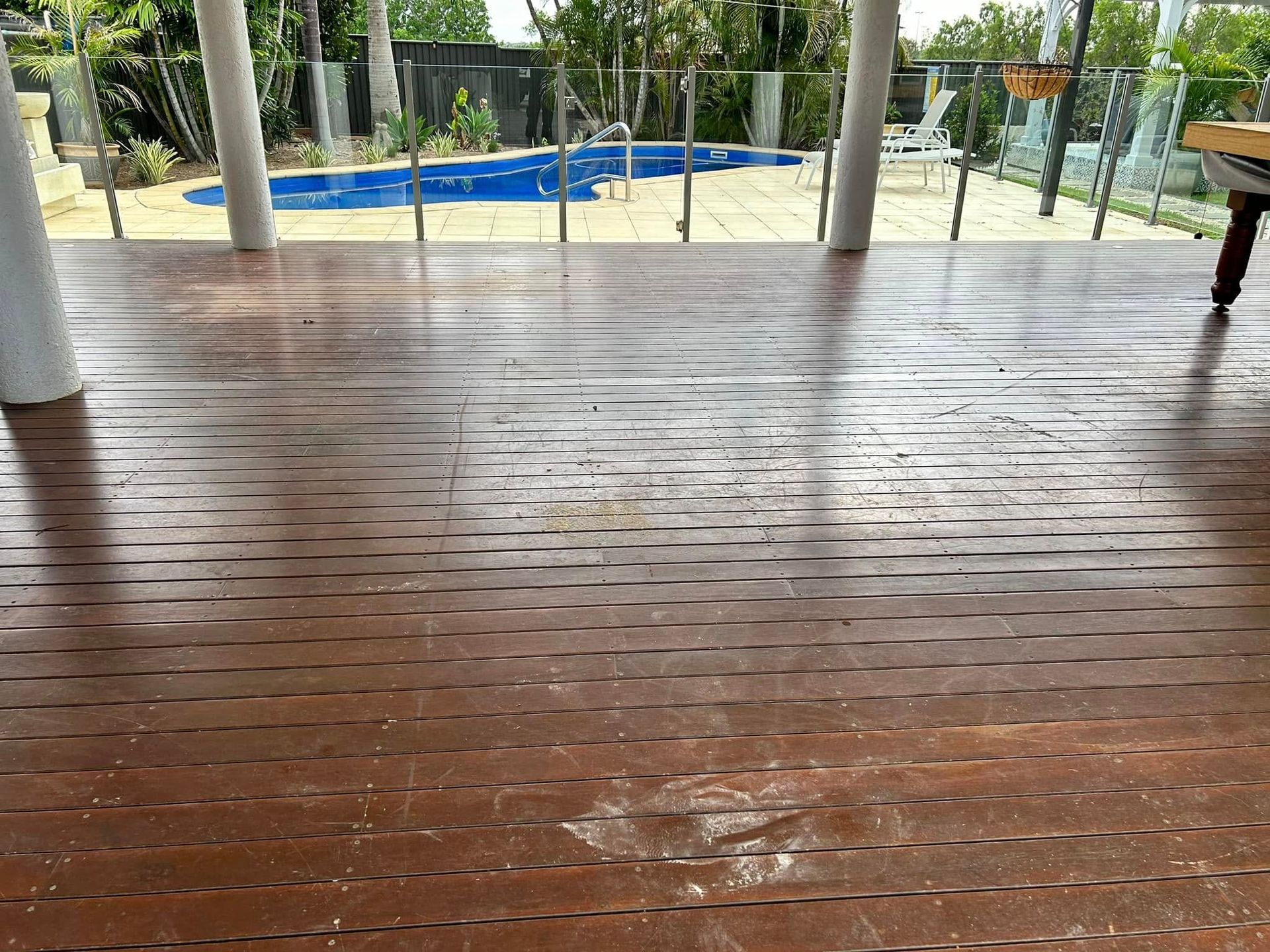 Wooden Deck Overlooking A Pool — Scott Johnston Floor Sanding in Port Douglas, QLD