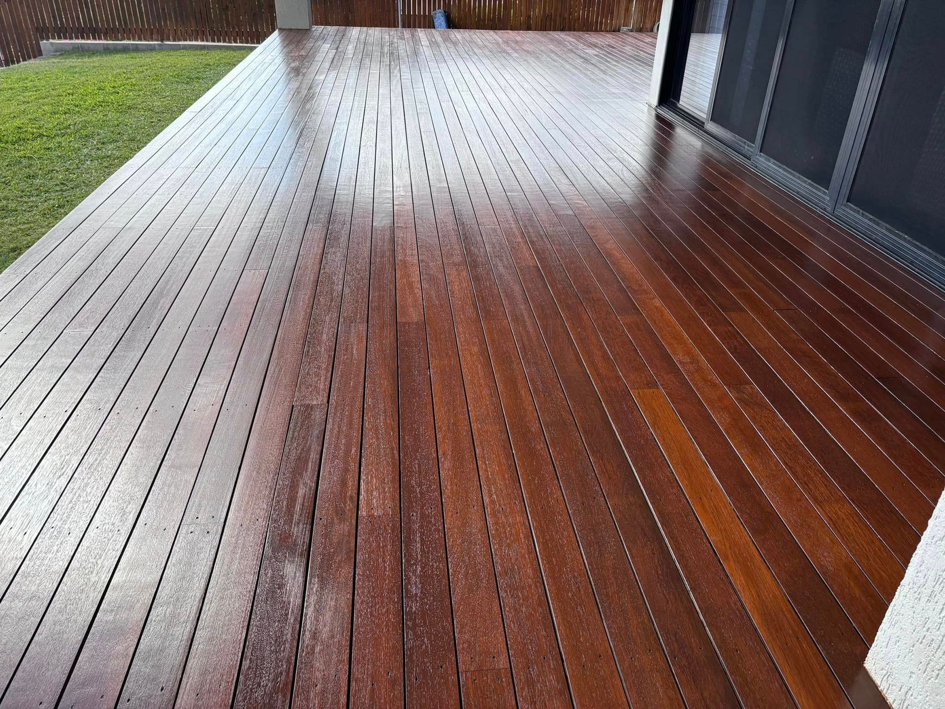 Hardwood Floor With Vertical Planks in Varying Shades of Brown — Scott Johnston Floor Sanding in Bentley Park QLD 