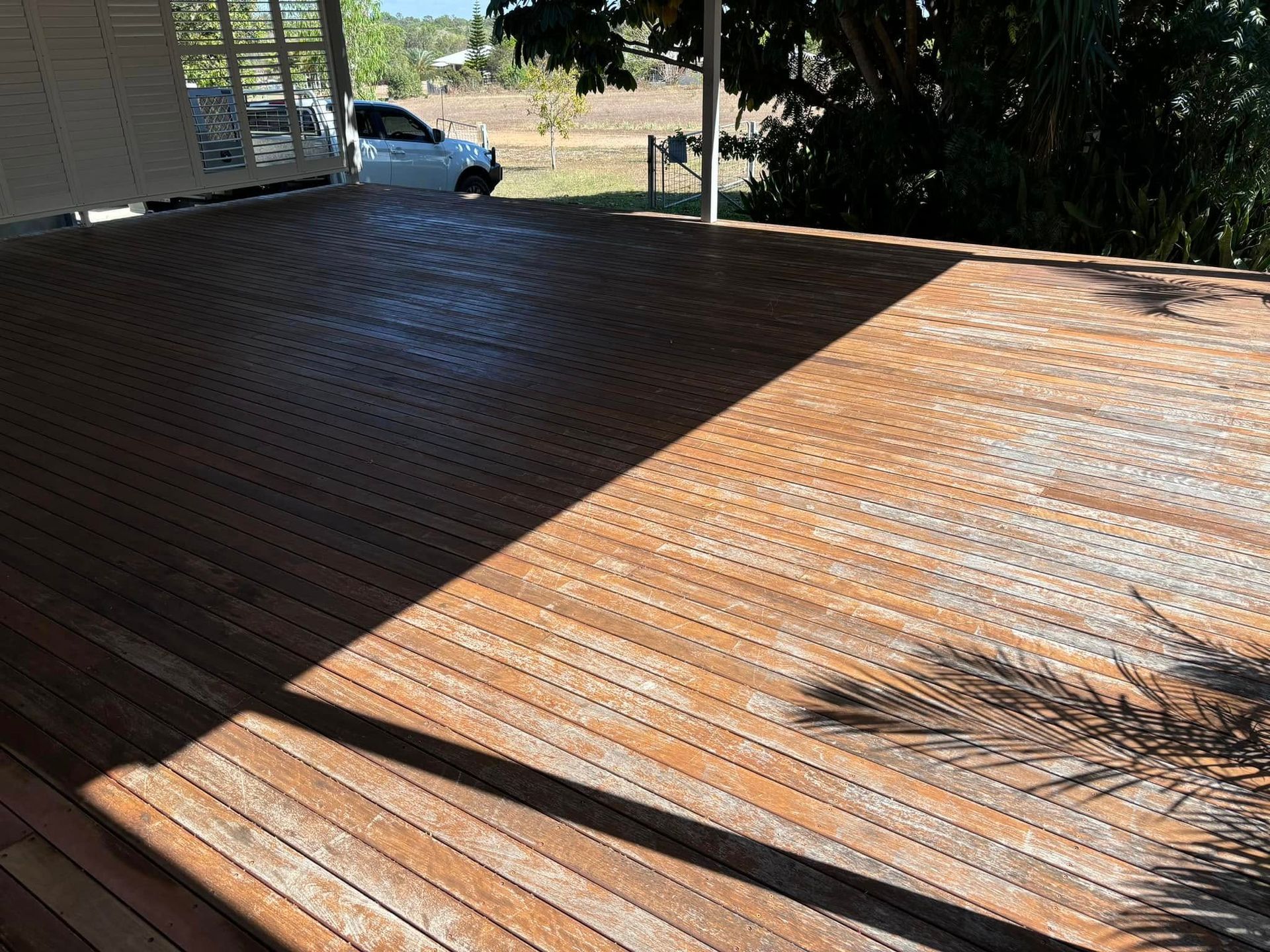 Wooden Deck With Worn, Reddish-brown Boards — Scott Johnston Floor Sanding in Bentley Park QLD