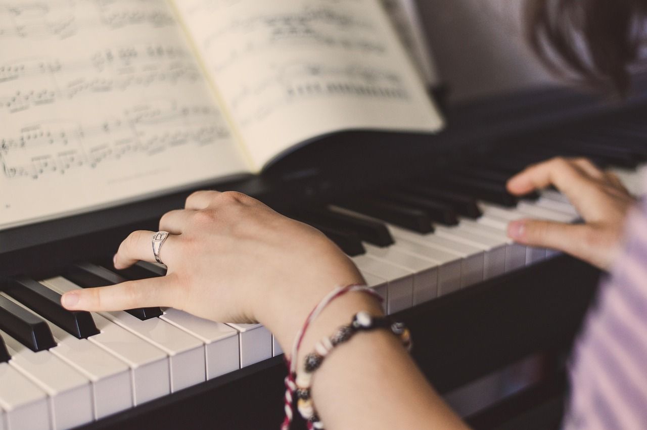 Picture of a woman playing the piano
