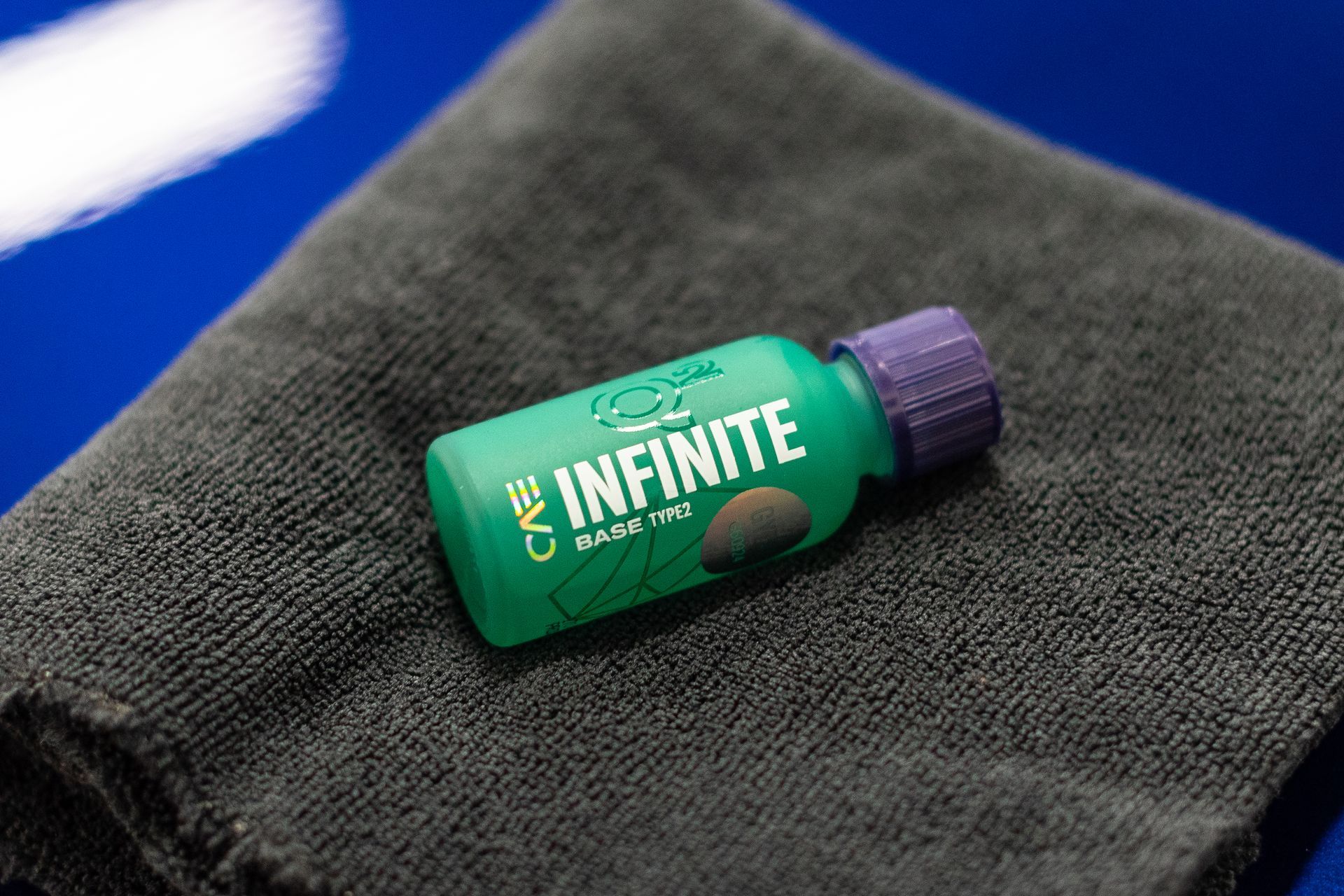 Green bottle of car care product labeled