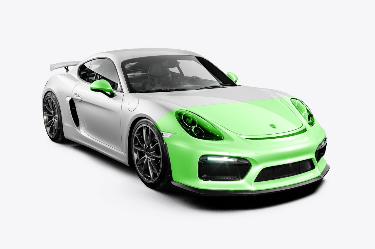 Silver Porsche sports car with green accents on a white background.