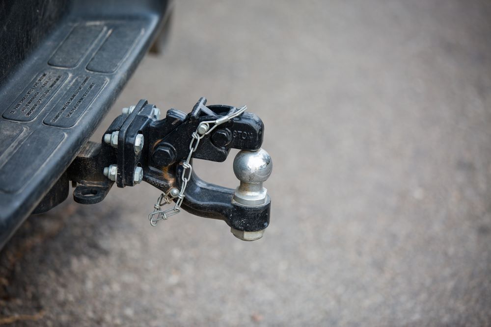 A Close Up of a Trailer Hitch Attached to the Back of a Truck — Sprint Mufflers, Exhausts & Mechanical Repairs in Stuart, NT
