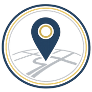 Blue map pin icon inside a white circle with gray roads and gold and blue rings