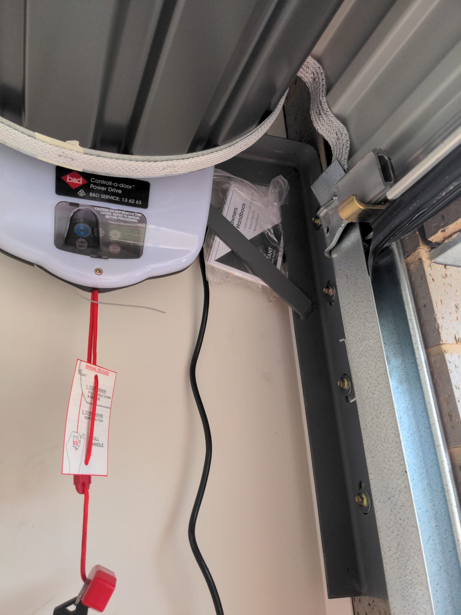 A close up of a garage door opener in a garage — Goldfields Garage Doors & Gates in Wendouree, VIC