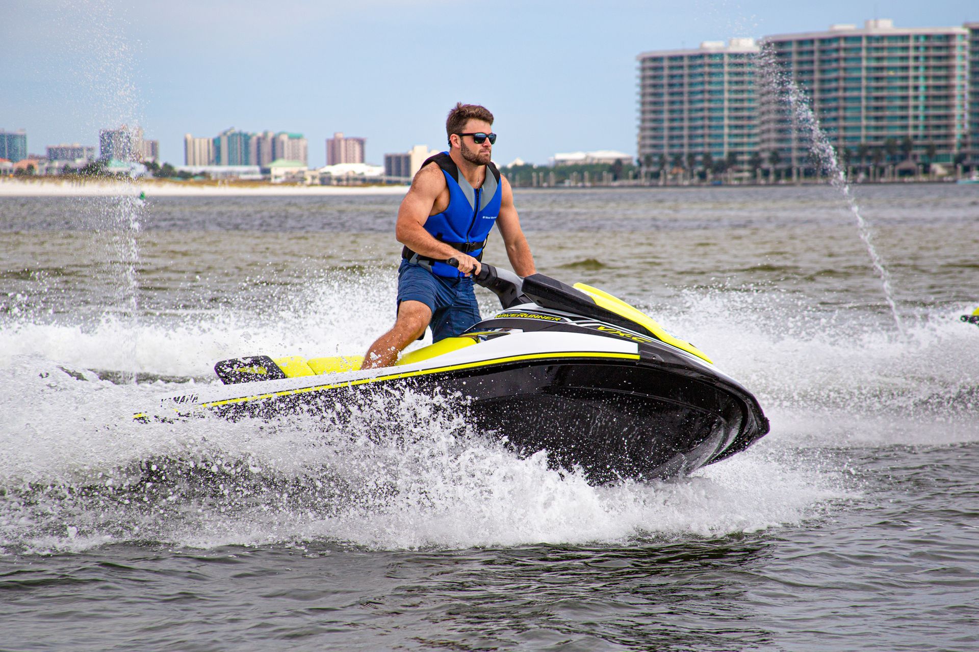 A man riding on a waverunner in Orange Beach