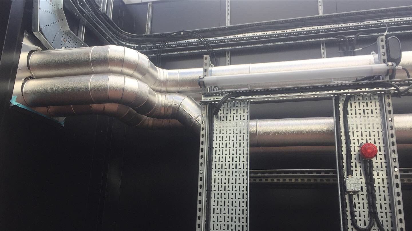 AC roof chiller pipework insulated and weather protected with aluminium cladding by Lagforce.