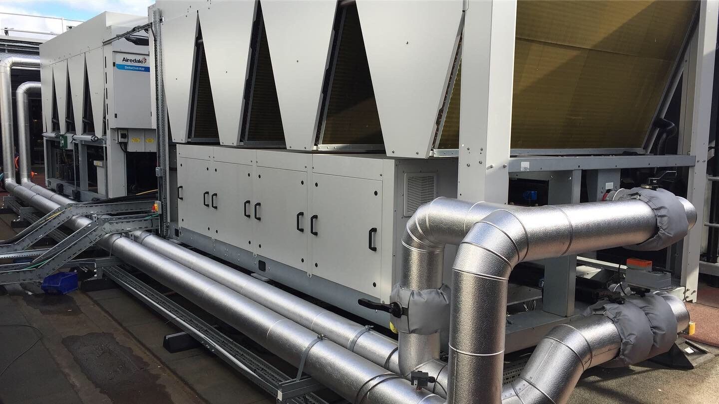 AC roof chiller pipework insulated and weather protected with aluminium cladding by Lagforce.