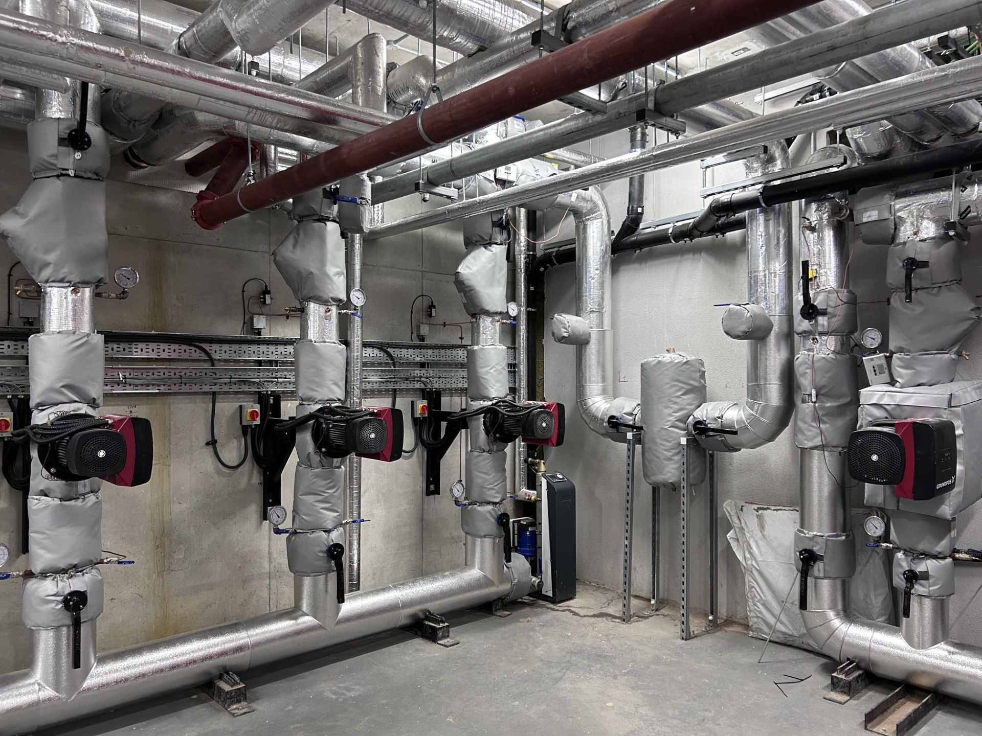 LTHW pipework and dirt separator insulated and had our sheet metal fabrication services applied to for energy efficiency 