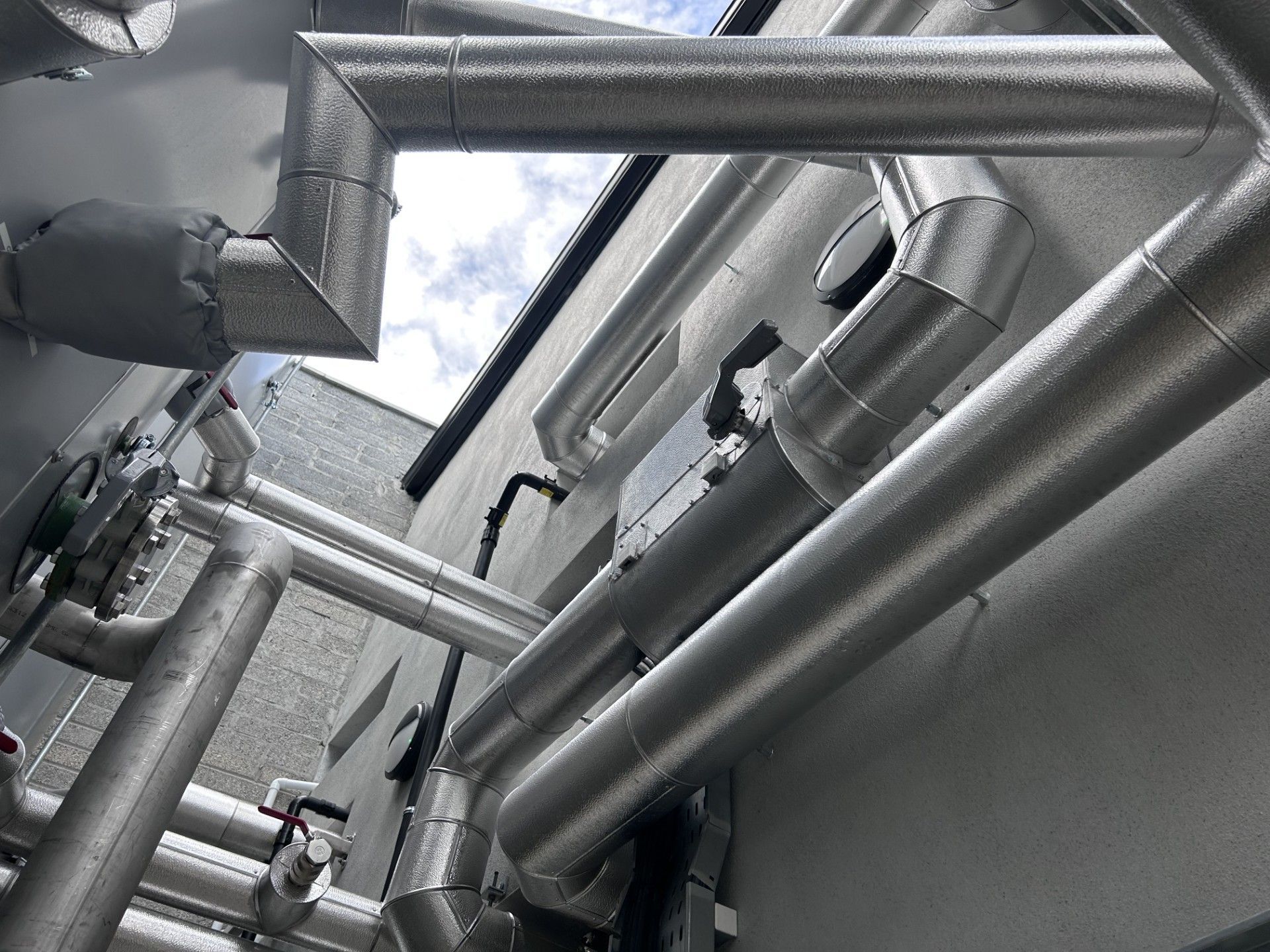 Aluminium cladding installed by Lagforce on external pipework in a new distillery in Galway Ireland
