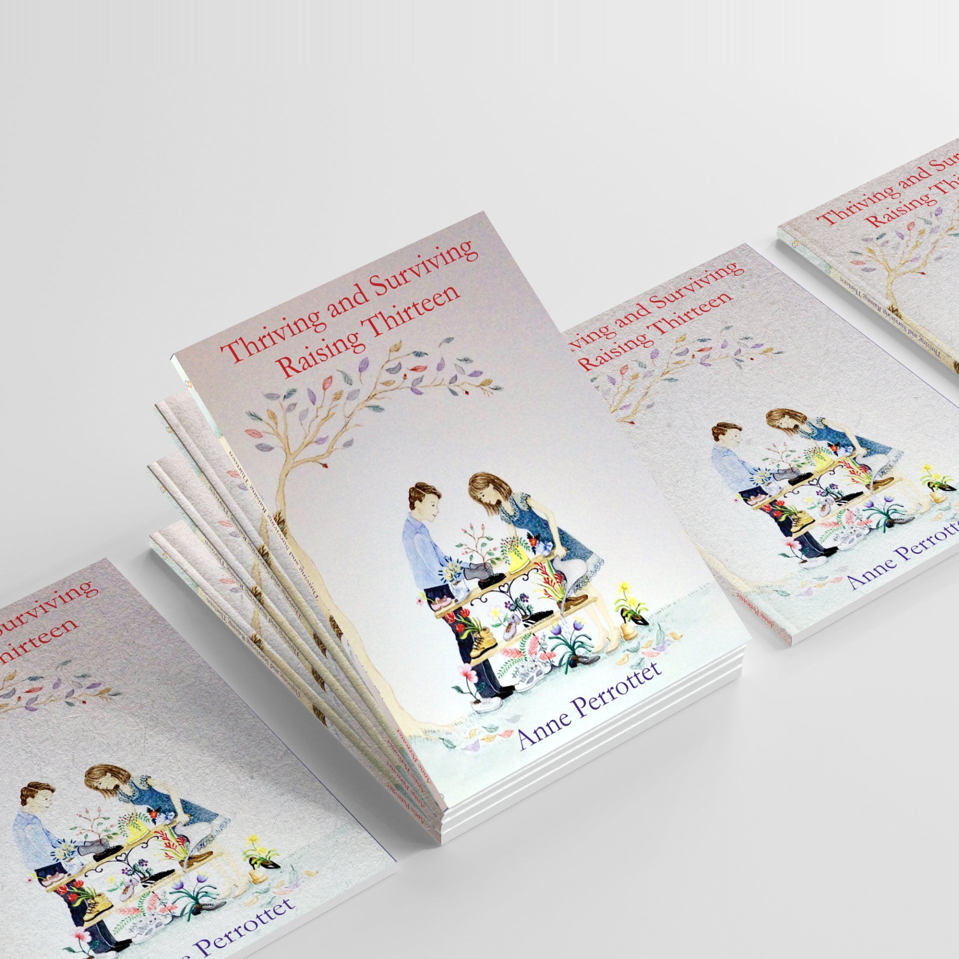 Stack of pastel booklets with a family illustration and floral cover on a white background