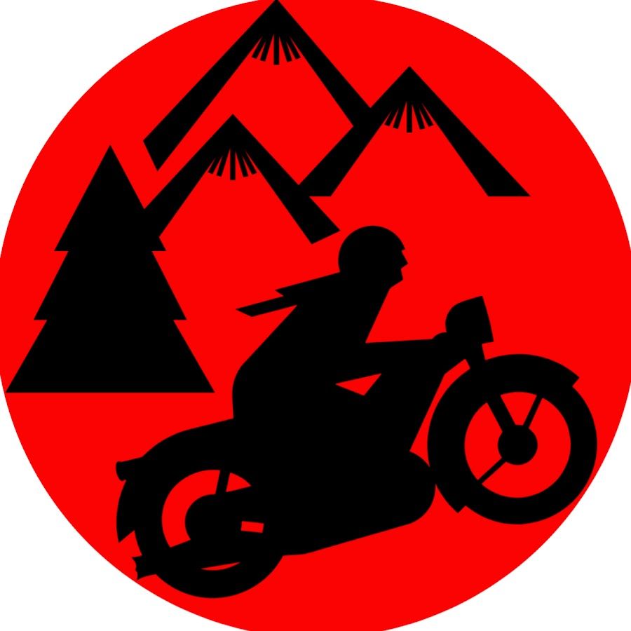 Black silhouette of a person riding a motorcycle in front of mountains and a tree, set against a red circle.