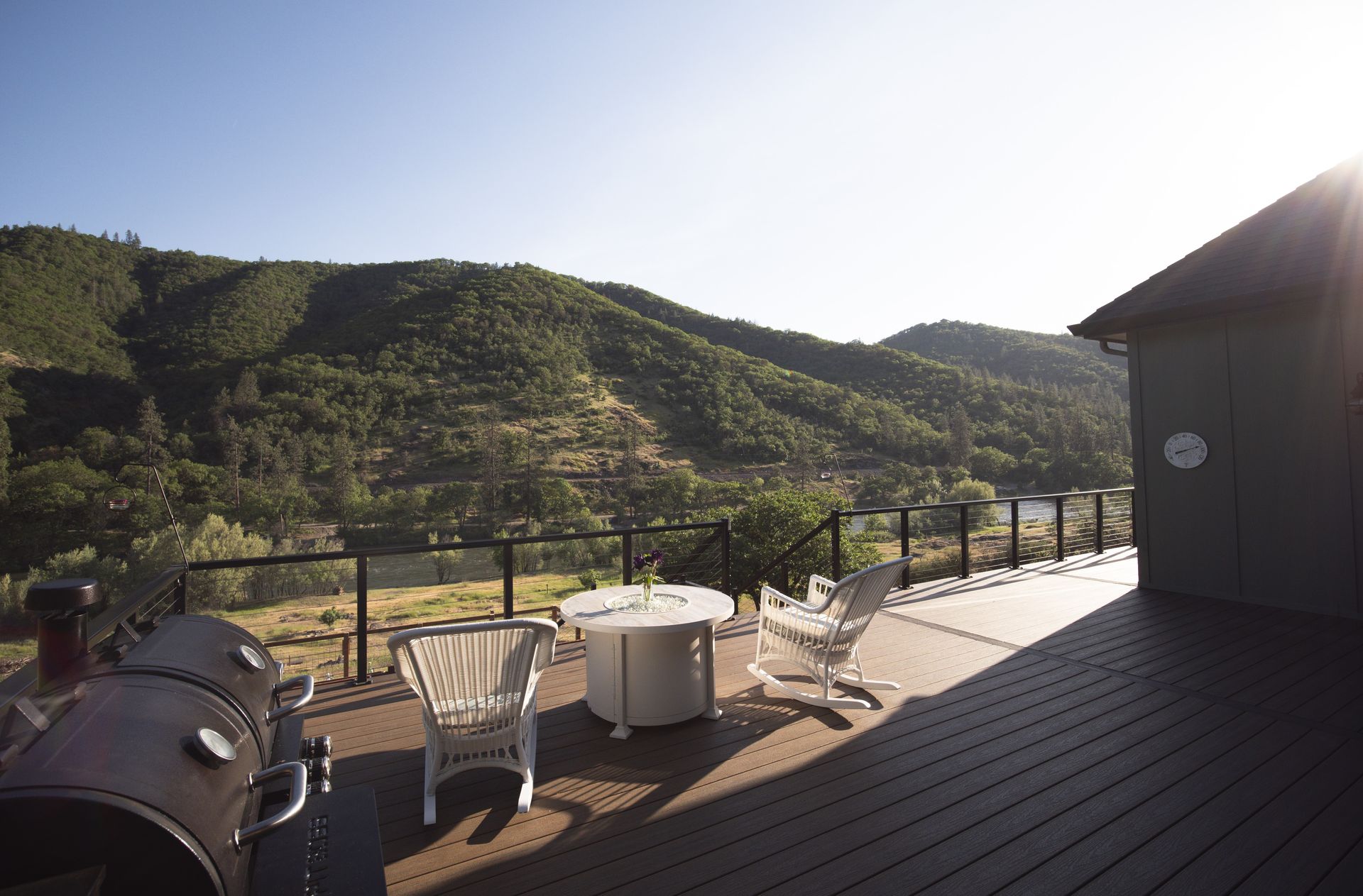 A large composite deck looking over the Rogue River in Gold Hill, Oregon.