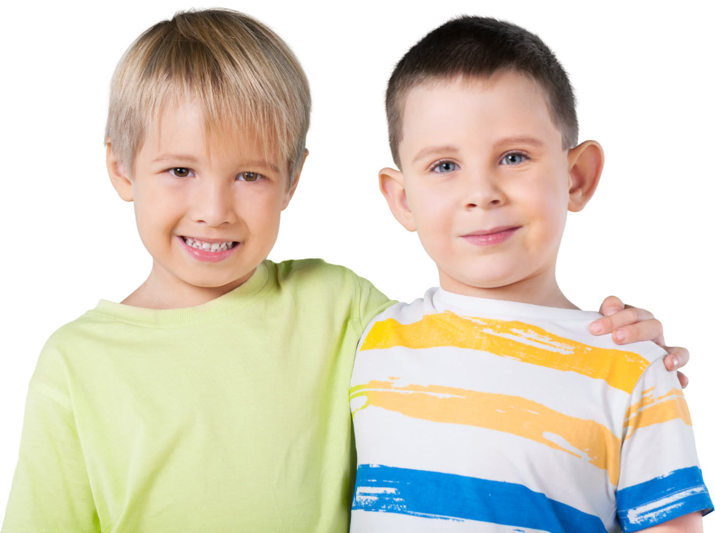 Two young boys are hugging each other and smiling for the camera.