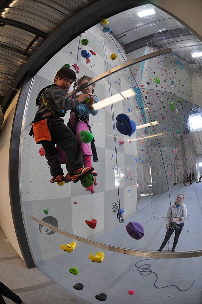 Two children climb