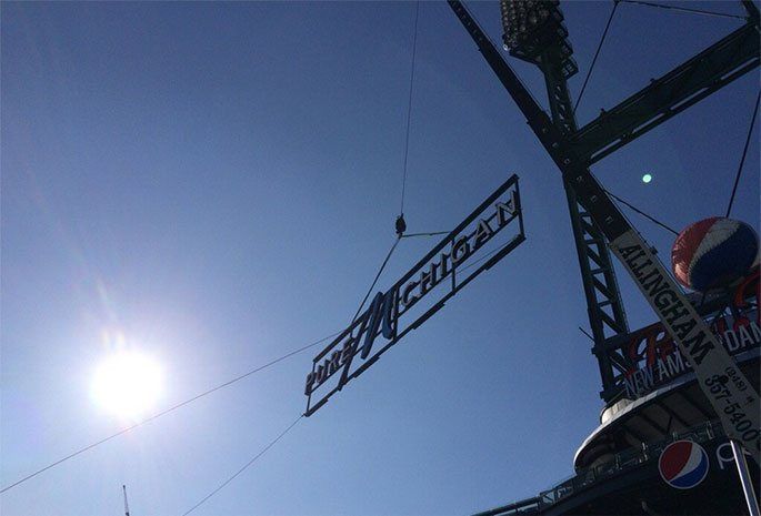 Large Sign Being Lifted