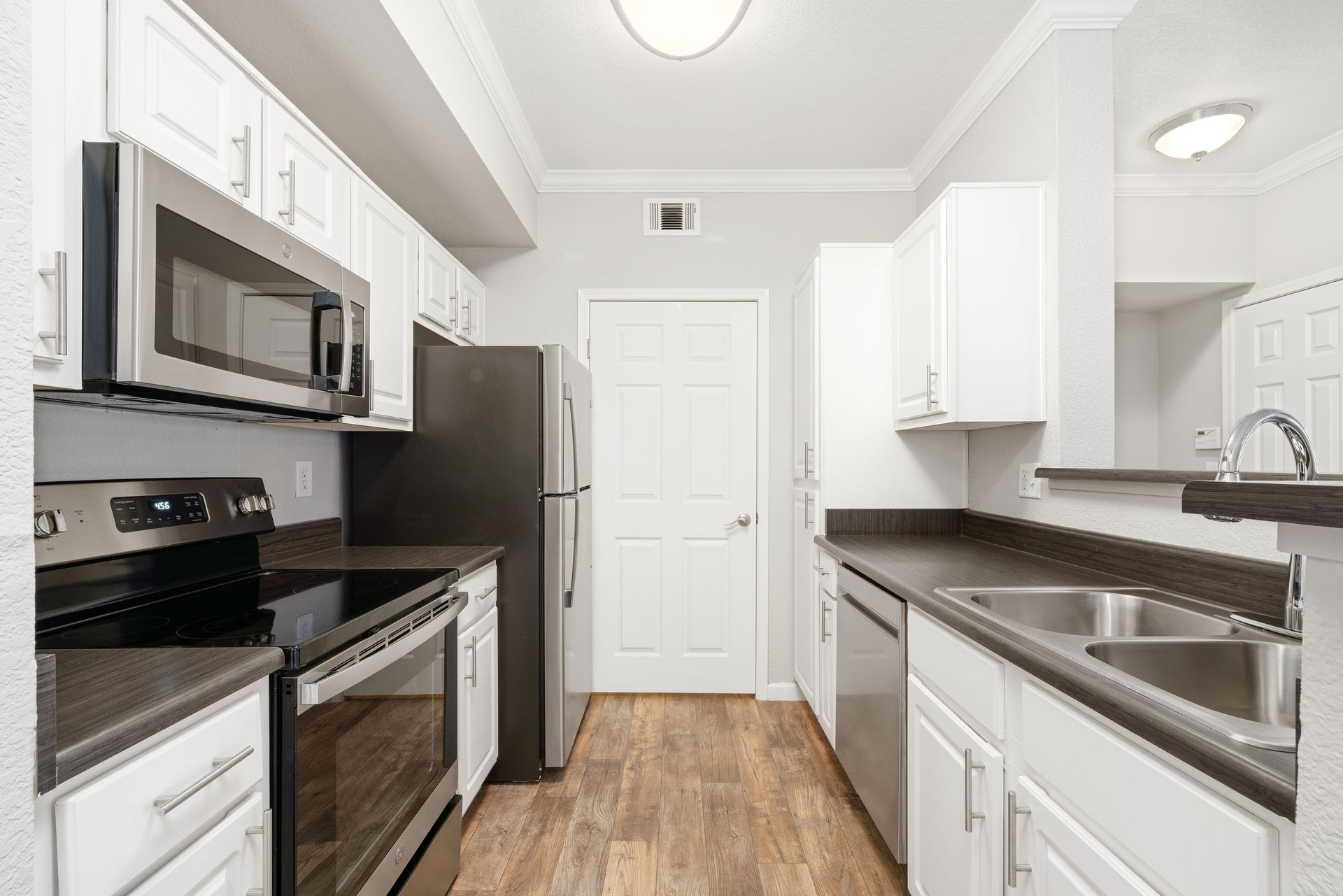 Renovated kitchen with stainless steel appliances