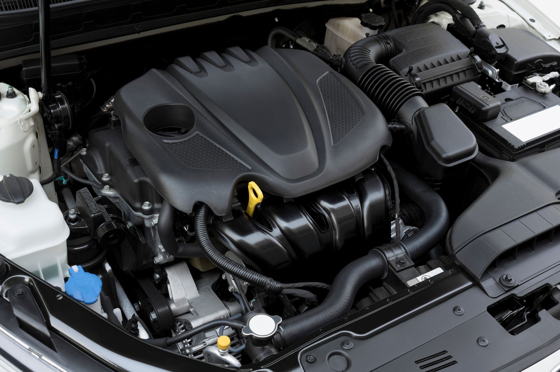 A close up of a car engine with the hood open| Ruckersville, VA | KEL-CAM Tire & Auto