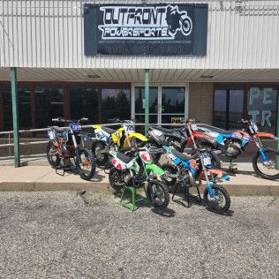 Motorbikes in Front of the Store