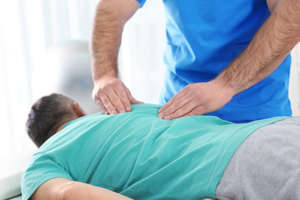 Man with Massage Therapist — Massage Therapist in Mount Louisa, QLD