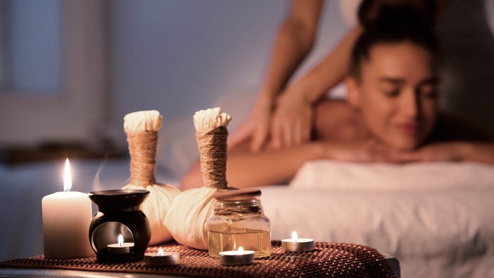 Woman Receiving Back Massage — Massage in Mount Louisa, QLD