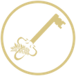 Gold circular emblem with a diagonal gold key and a small white fern-like design