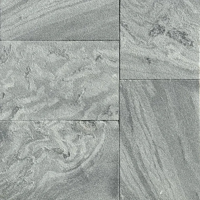 Gray stone tiles with swirling patterns and texture — Premier Bricks, Blocks & Pavers In Heatherbrae, NSW