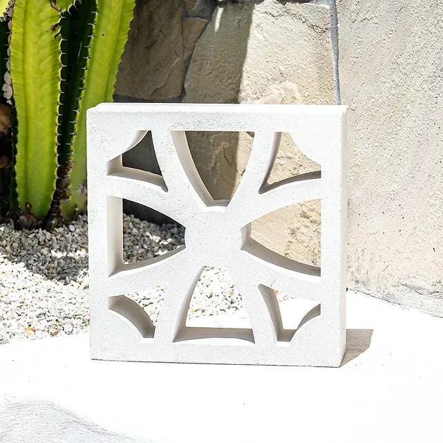 White concrete decorative block with sunburst design — Premier Bricks, Blocks & Pavers In Heatherbrae, NSW