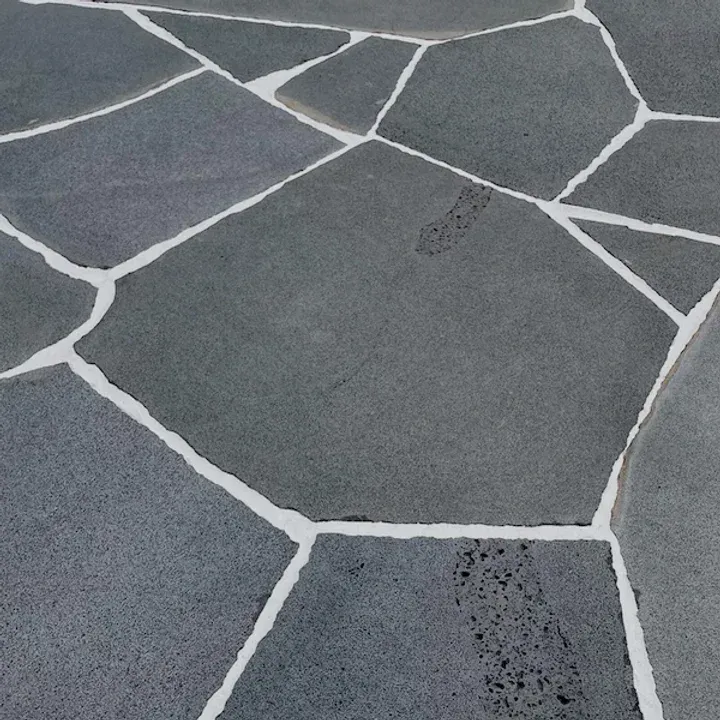 Irregular gray flagstones with white grout — Premier Bricks, Blocks & Pavers In Heatherbrae, NSW