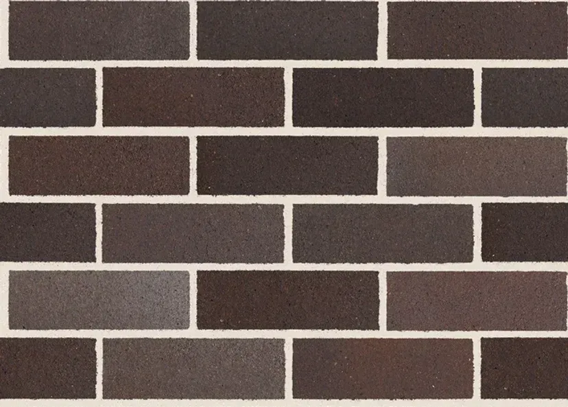 Close-up of a brick wall with varied dark brown bricks and white mortar — Premier Bricks, Blocks & Pavers In Heatherbrae, NSW
