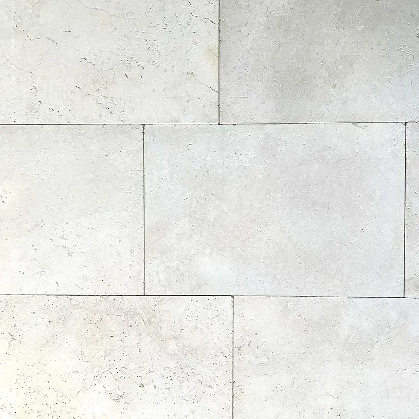 White rectangular stone tiles with a textured surface — Premier Bricks, Blocks & Pavers In Heatherbrae, NSW