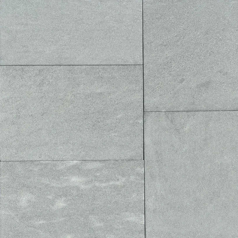 Gray rectangular stone tiles arranged in a grid pattern — Premier Bricks, Blocks & Pavers In Heatherbrae, NSW