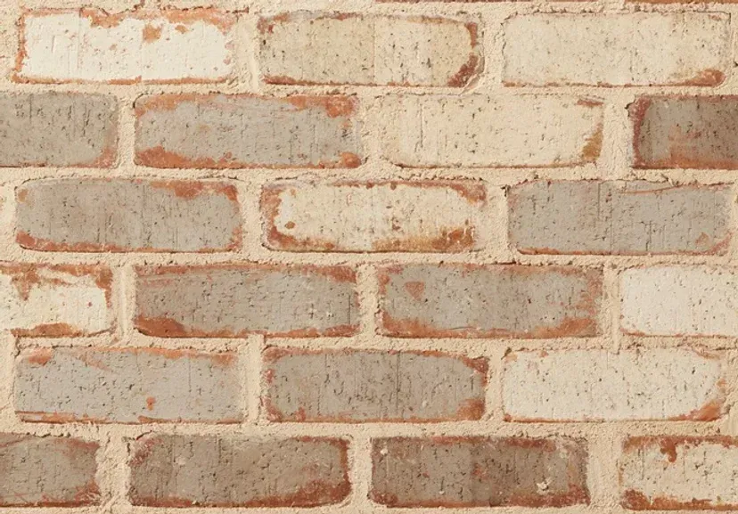 Close-up of a brick wall with alternating light and medium-toned bricks — Premier Bricks, Blocks & Pavers In Heatherbrae, NSW