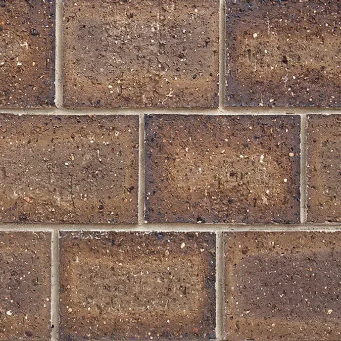 Brown brick wall with light-colored mortar between rectangular bricks — Premier Bricks, Blocks & Pavers In Heatherbrae, NSW