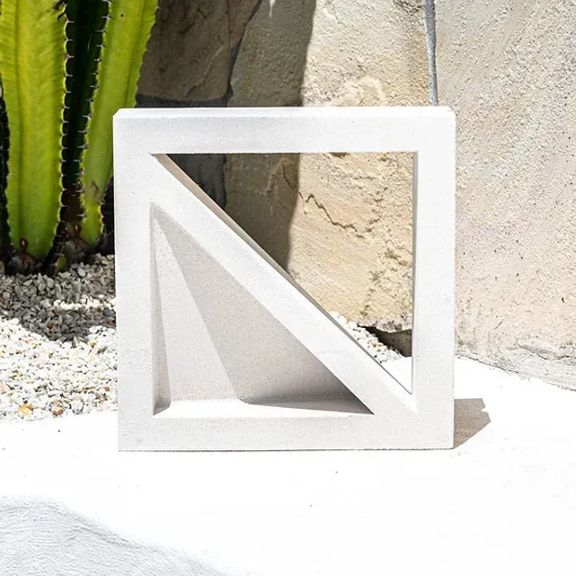 White square concrete block with a diagonal support — Premier Bricks, Blocks & Pavers In Heatherbrae, NSW