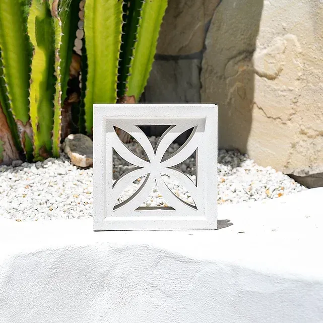White concrete breeze block with a floral cutout — Premier Bricks, Blocks & Pavers In Heatherbrae, NSW